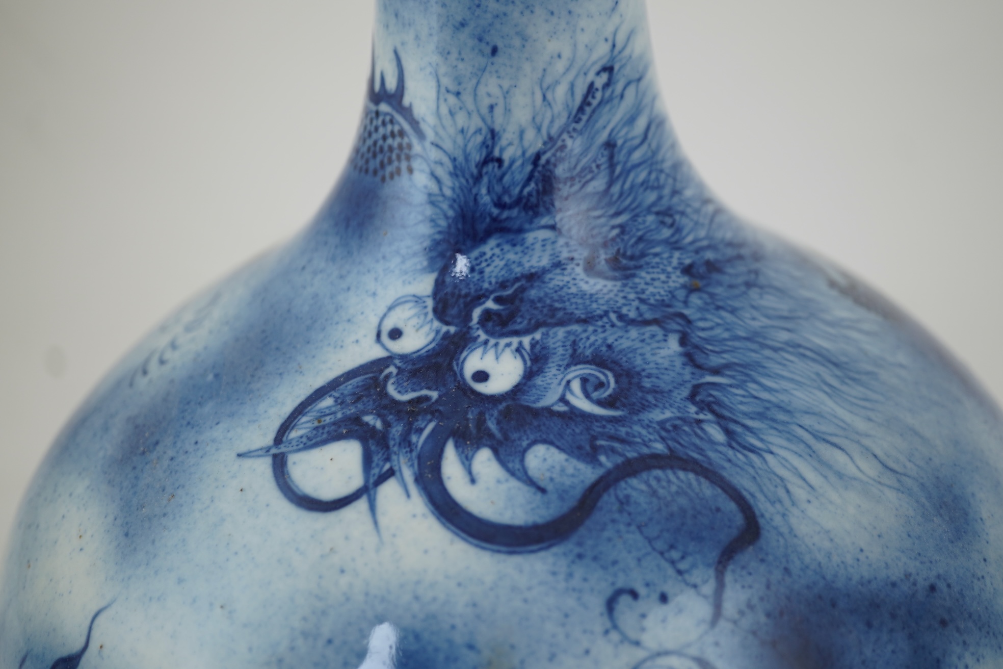 A Chinese blue and white ‘dragon’ bottle vase, 19th century